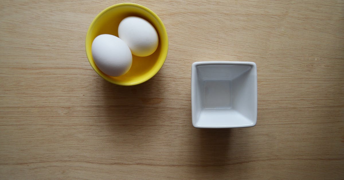 Egg freshness--stale eggs at market? - Two White Eggs in Yellow Ceramic Bowl