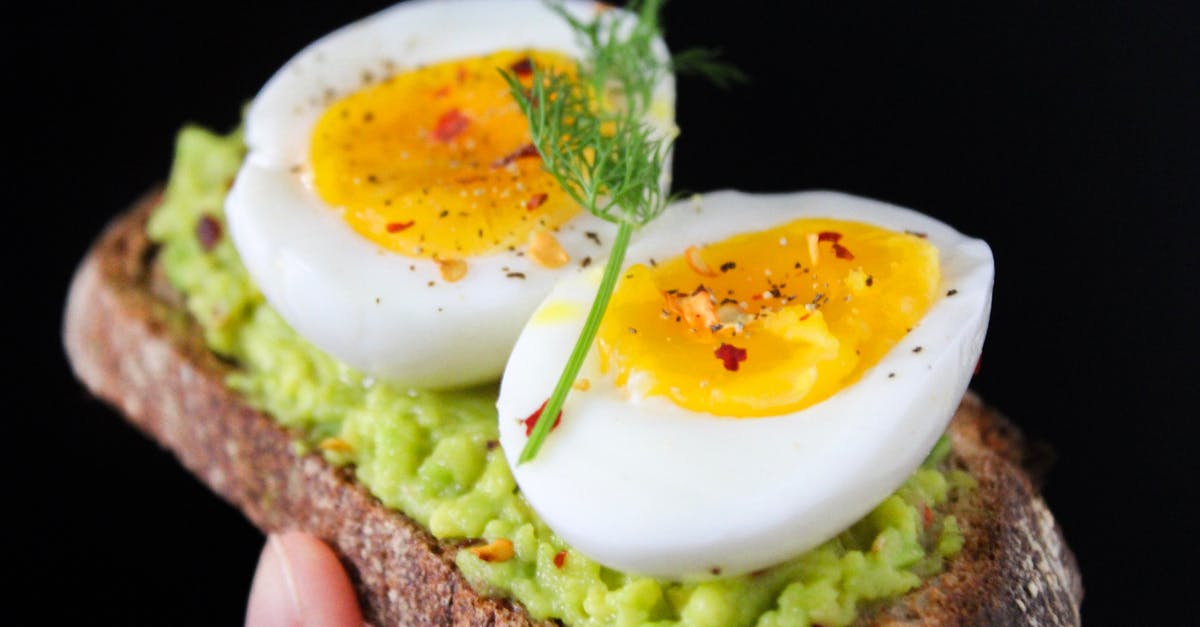 Egg In My Bread - Sliced Egg on Top of Green Salad With Bread