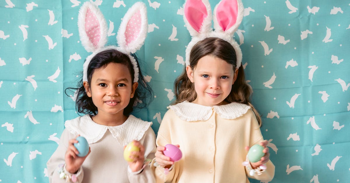 Egg nog recommendation diabetic friendly - Smiling multiethnic children with bunny ears and plastic eggs looking at camera against fabric with rabbit pattern during festive event