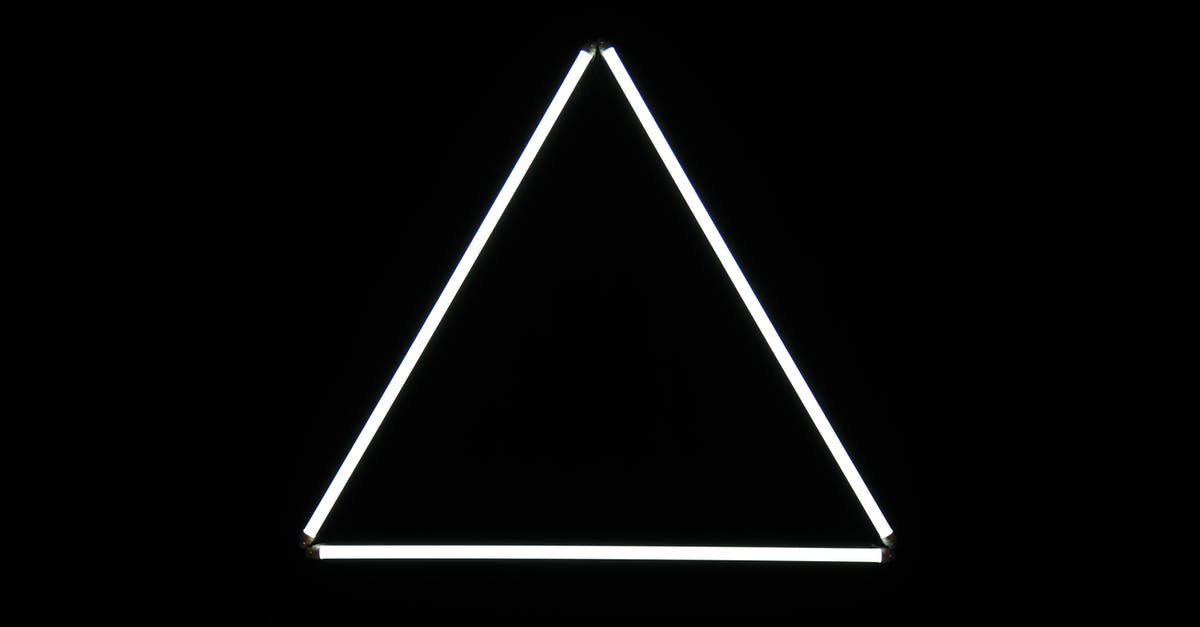 Even heating: skillet thickness vs. electric element size - White triangle on black background
