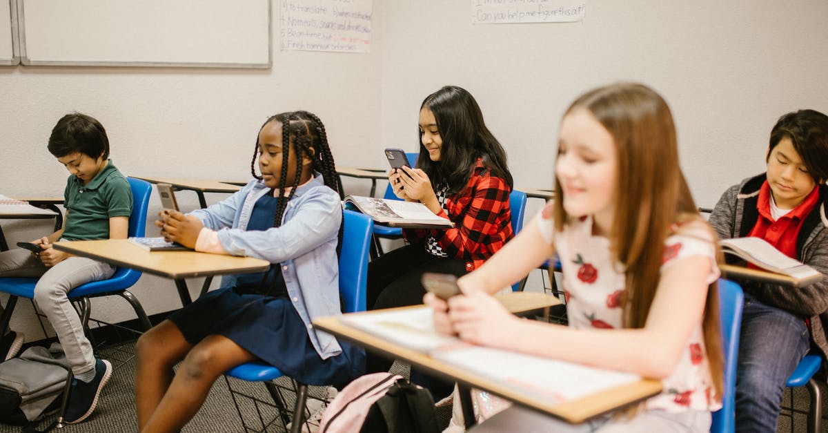 Exactly which kind of cardamom should I use in pho (phở)? - Students Sitting Inside the Classroom While Using Their Smartphone