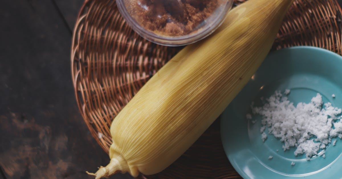 Exotic pop corn receipe [closed] - Yellow Corn on Brown Rattan Plate