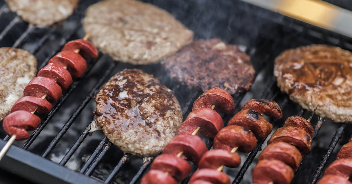 Extremely hard layer after cooking the burger on the grill - Grilled Spiral Sausage With Steak