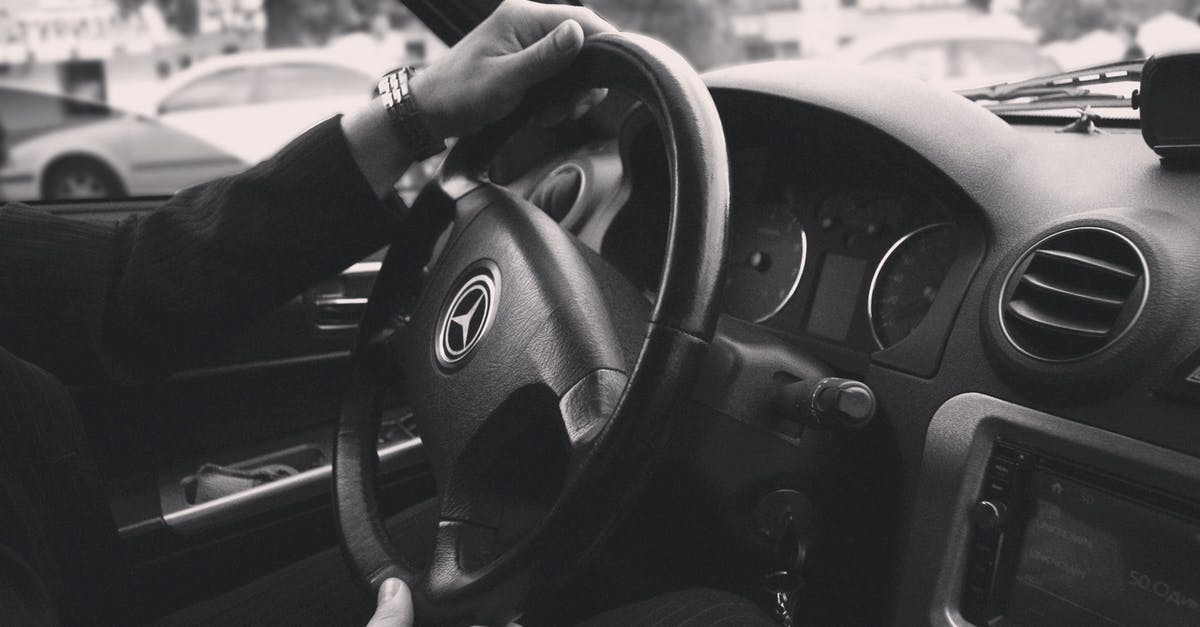 Fast meringue technique - Grayscale Photography of Person Driving a Car