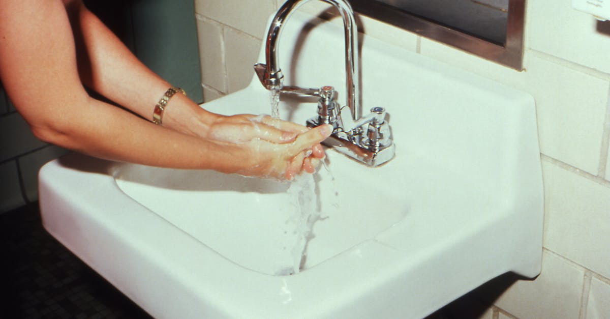 Faster to wet cure in room temp? - Person Washing Hands on Sink