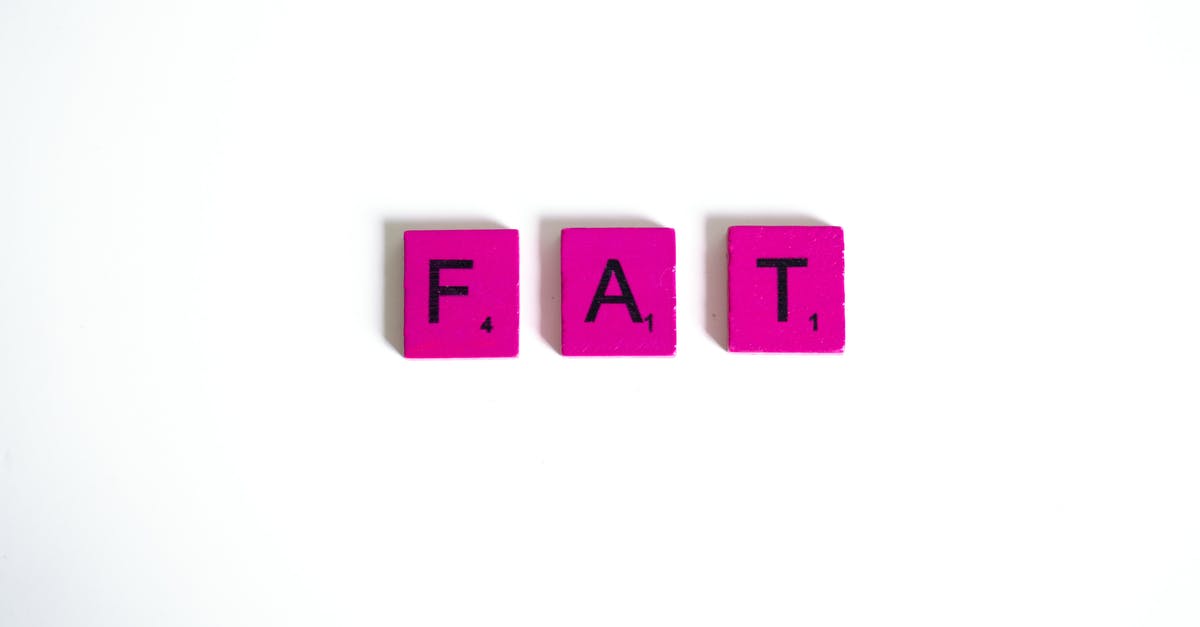 Fat free dumplings? - Scrabble Letter Tiles on White Background