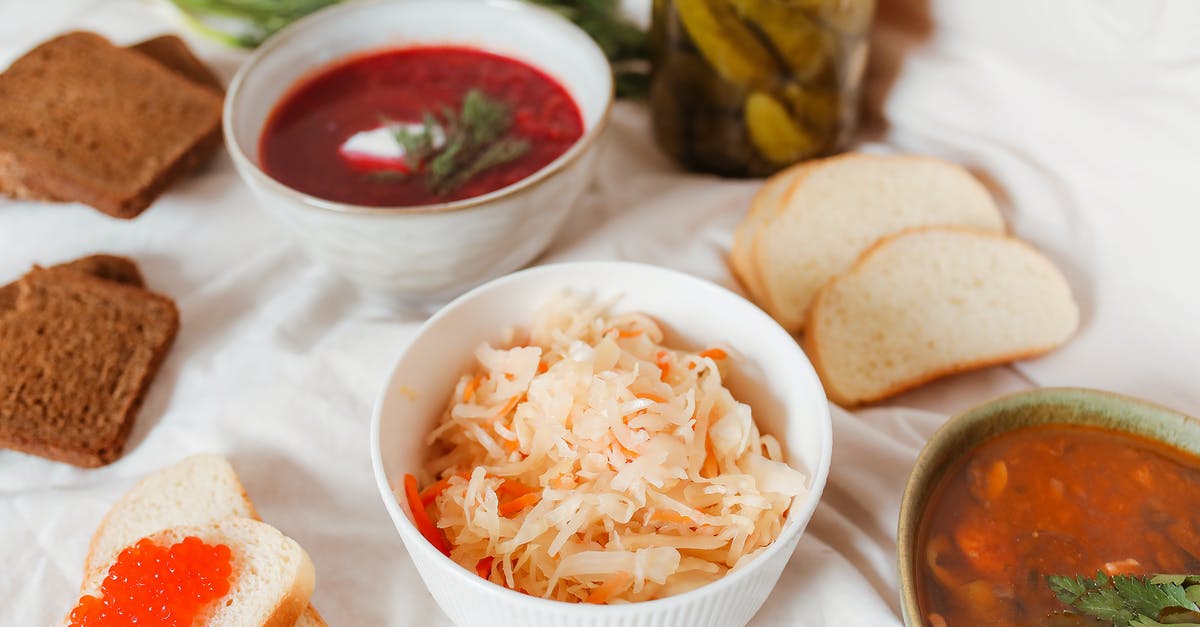 Fermenting Sauerkraut - Should I Stir? - A Delicious Bowls of Food with Slices of Breads and Salmon Roe