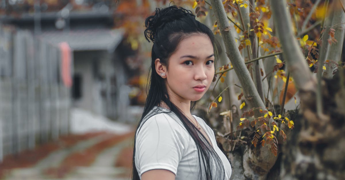 Fish balls aren't bouncy and fall apart easily - Young Woman in a White T-shirt Outdoors in Autumn 