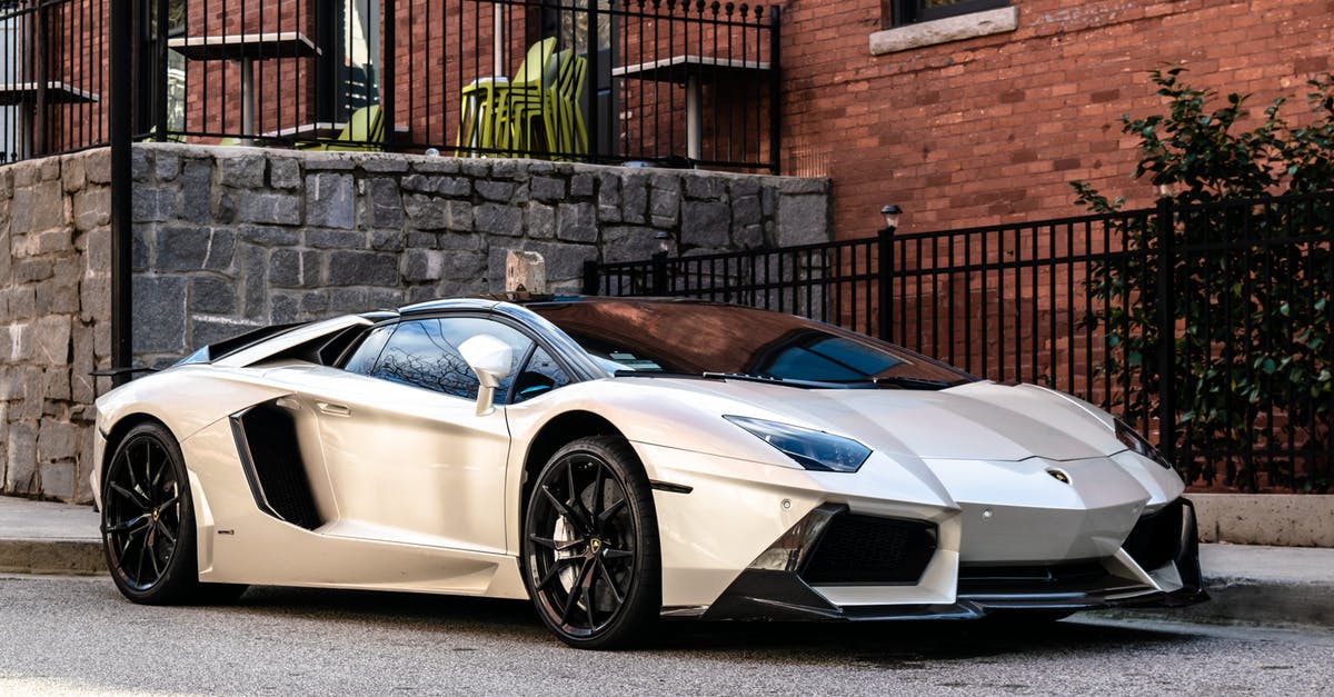 Fix fudge that is too rich - White and Blue Lamborghini Aventador Parked Beside Brown Brick Wall