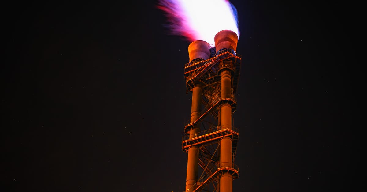 Flammable gas emitted by sausage - Low Angle View of Illuminated Tower Against Sky at Night