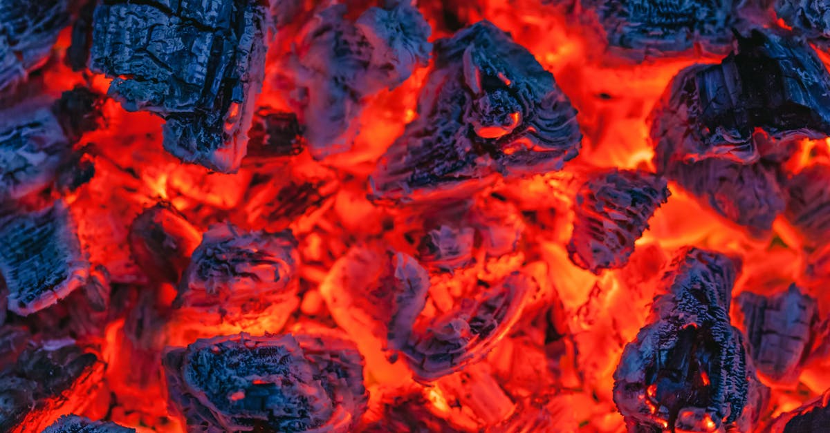 flash fire from self-cleaning oven - From above of many hot burning coals placed in bonfire in evening time