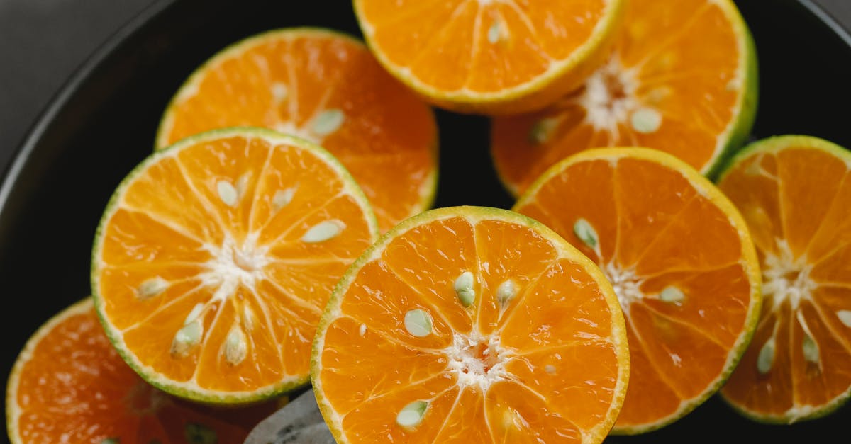 flexible food grade plastics that won't melt at 105 C - Sliced fresh juicy oranges with seeds in bowl