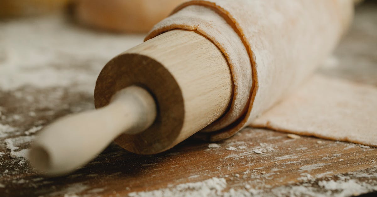 Flour/Instant Dry Yeast Ratio in Thin Pizza Dough - Thin dough on rolling pin on messy table