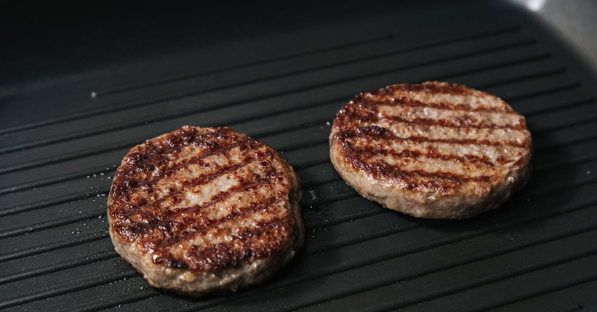 Foil wrap cooking fully assembled burger in George Foreman grill? - Photo of Beef Patties Being Grilled