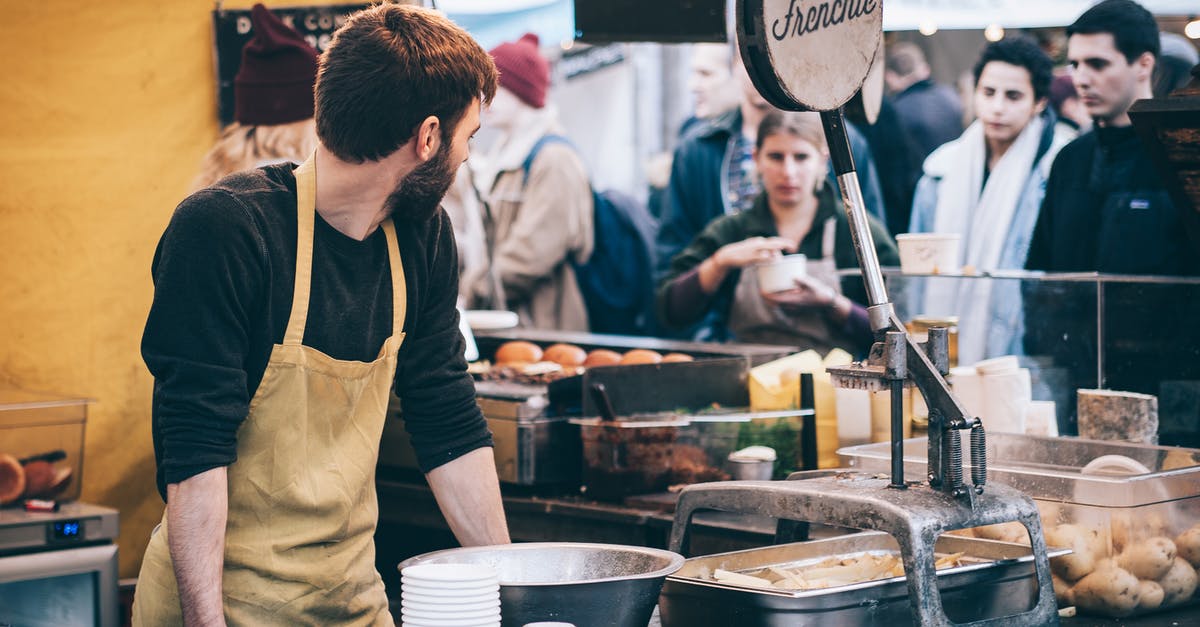 Food industry: where does buttermilk go? - Man Standing in Front of Bowl and Looking Towards Left