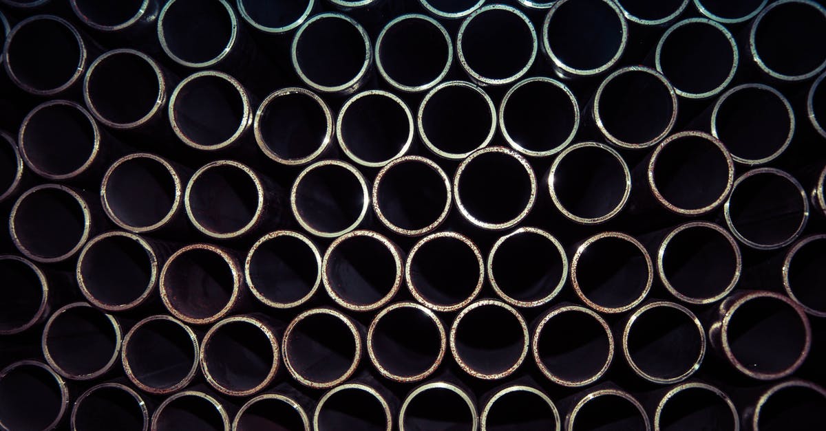 Food Processor Feeder Tube Hole - What Is It Called and How Does It Work? - Close Up Photo of Gray Metal Pipes Food Processor Feeder Tube Hole - What Is It Called and How Does It Work? - Close Up Photo of Gray Metal Pipes