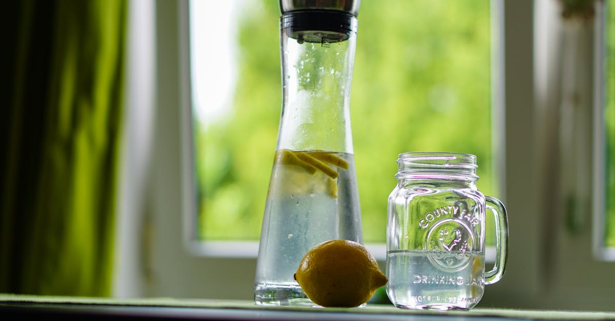 For Boiling Water Canning (not pressure canning) can you use other glass jar other than Mason Jar? - Shallow Focus Photography of Yellow Lemon Near Glass Mason Jar and Glass Decanter