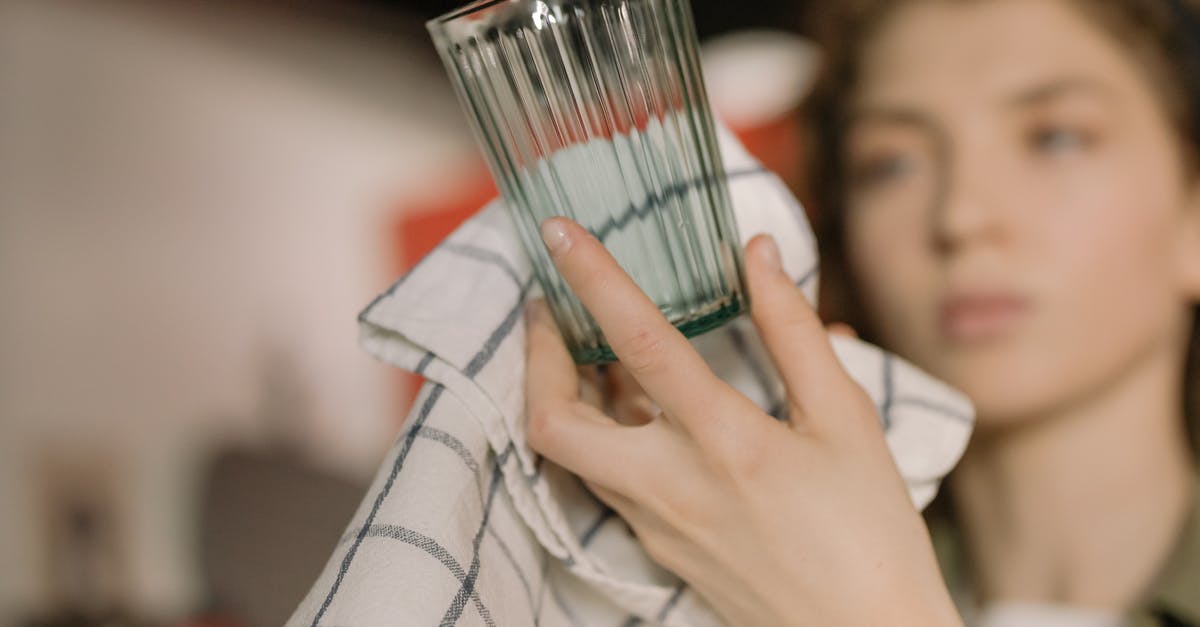 For what dishes I should wash starch off red lentils? - Man in White and Black Checkered Dress Shirt Holding Drinking Glass