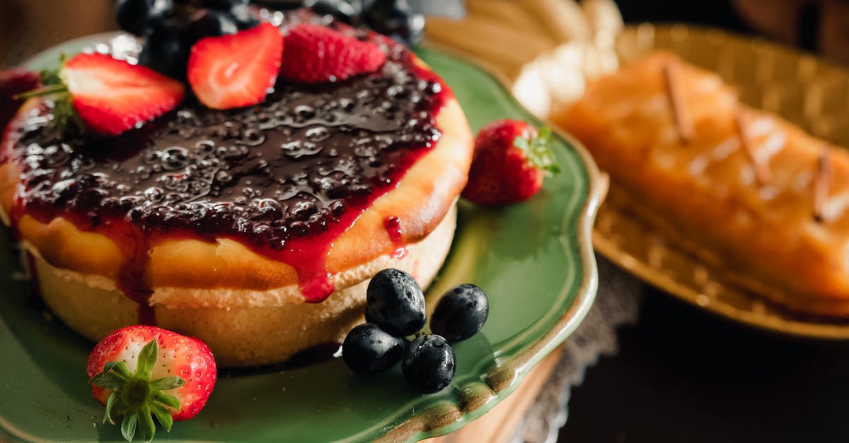 Freezing cheesecake with strawberries - Cheesecake with Blueberries on Green Ceramic Plate