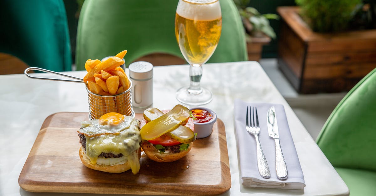 Freezing partially cooked hamburger patties - Hamburger and Potato Wedges Served on Wooden Board