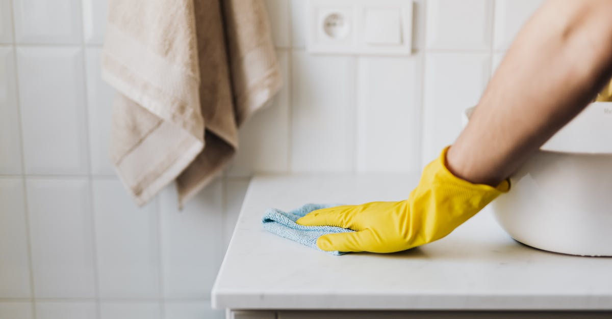 Fresh pasta work surface - Crop housewife cleaning surface near sink