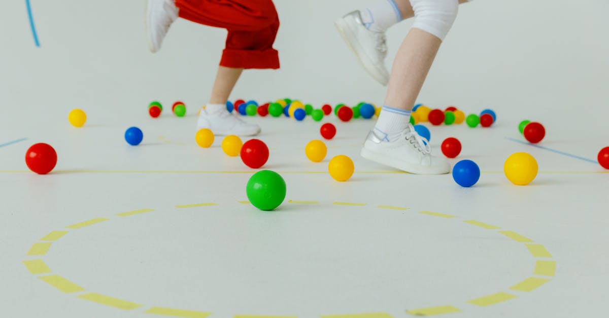 Fried Dough Balls Too Doughy [closed] - People Running on the Floor with Colorful Balls 