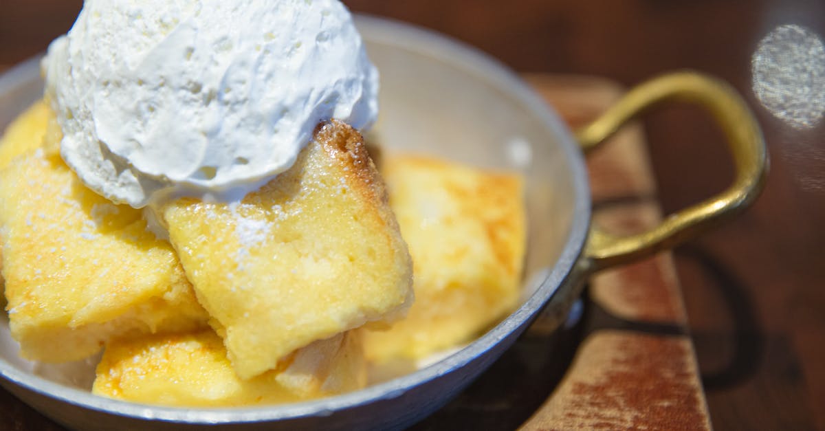 Frosting kept melting when trying to frost cake - Delicious vanilla dessert with ice cream