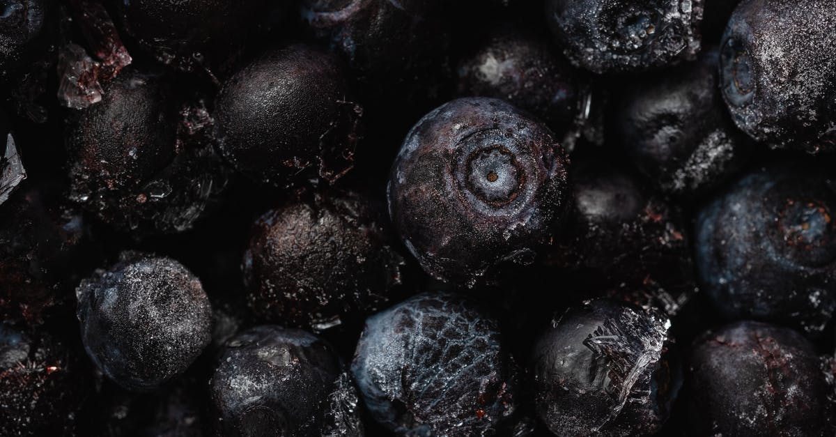 frozen blueberries kept thawed - Close-Up Shot of Frozen Blueberries