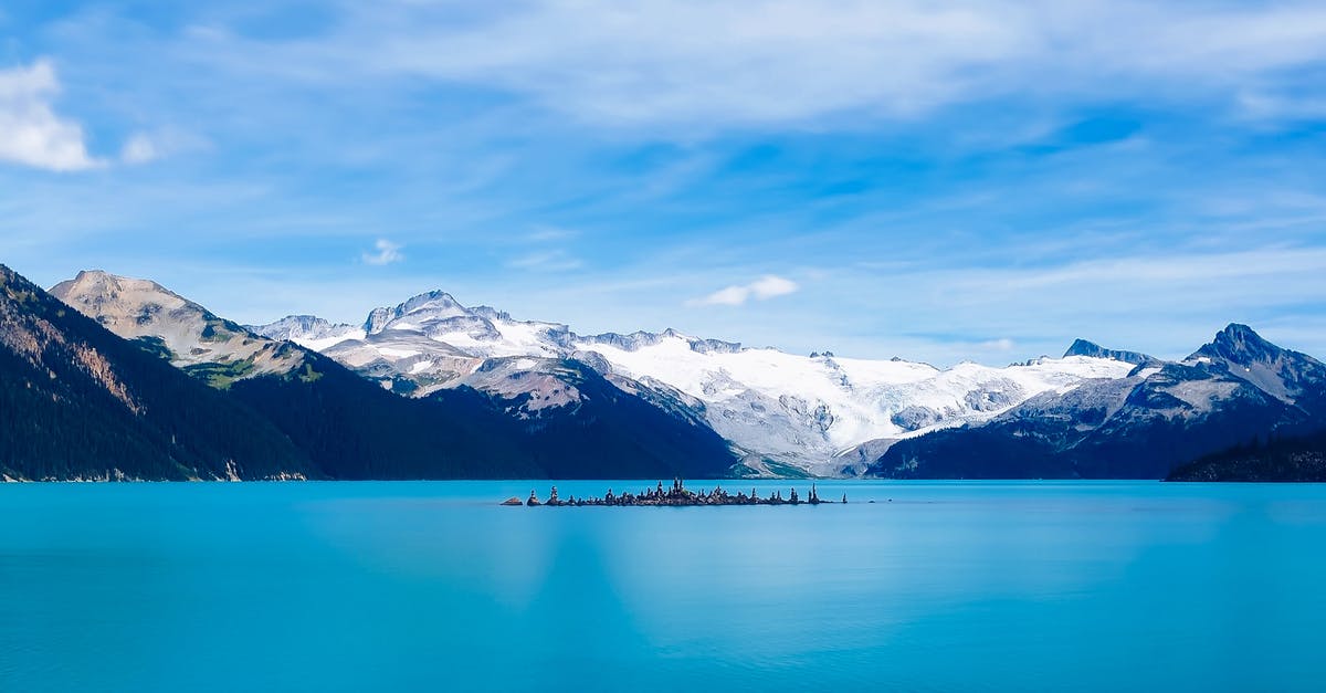 Frozen sea squirts: any suggests on cleaning/preparing? - Scenic View of Frozen Lake Against Mountain Range