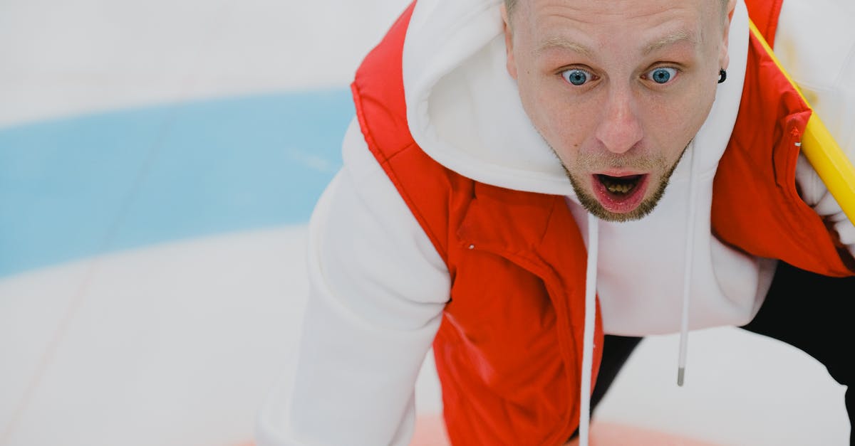 Frozen turkey breast worry - Amazed man in sportswear with opened mouth and broom playing curling on ice sheet with circular target area during game in playing area