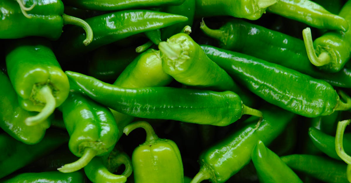 Fruit Flies and Storage of Fresh Produce - Close-Up Photo of Green Chili Peppers