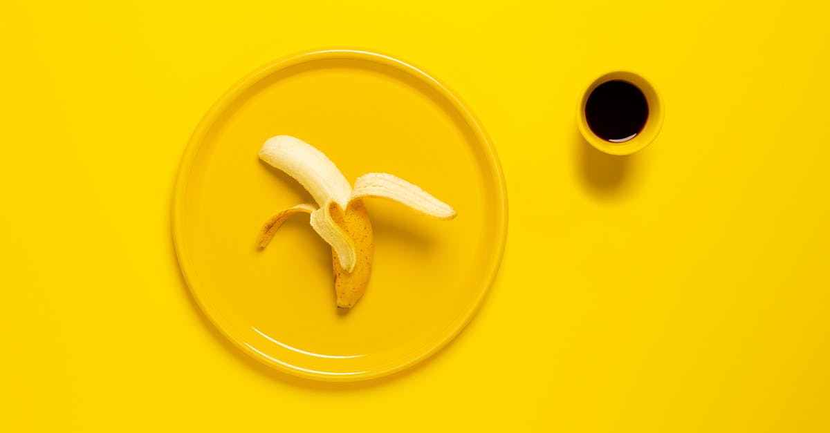 Fruit peeling techniques - Yellow Banana on Plate