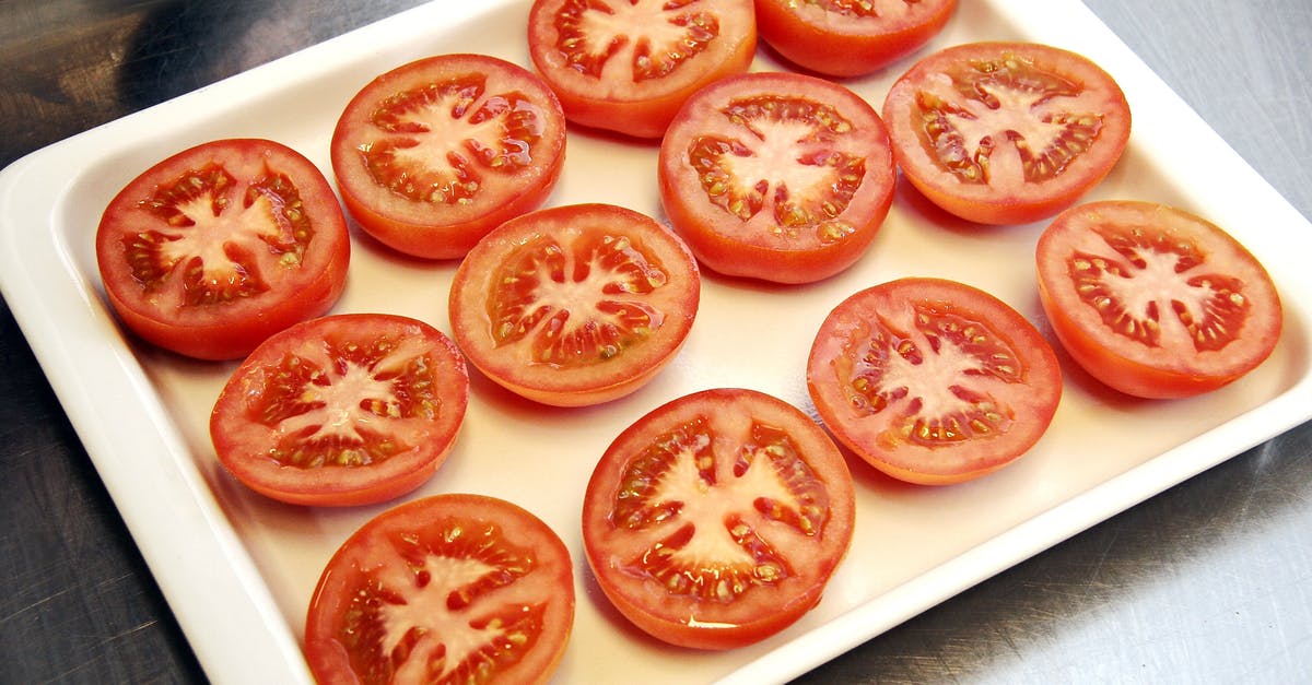 Fruit salad with tomatoes - Sliced Tomatoes on Tray