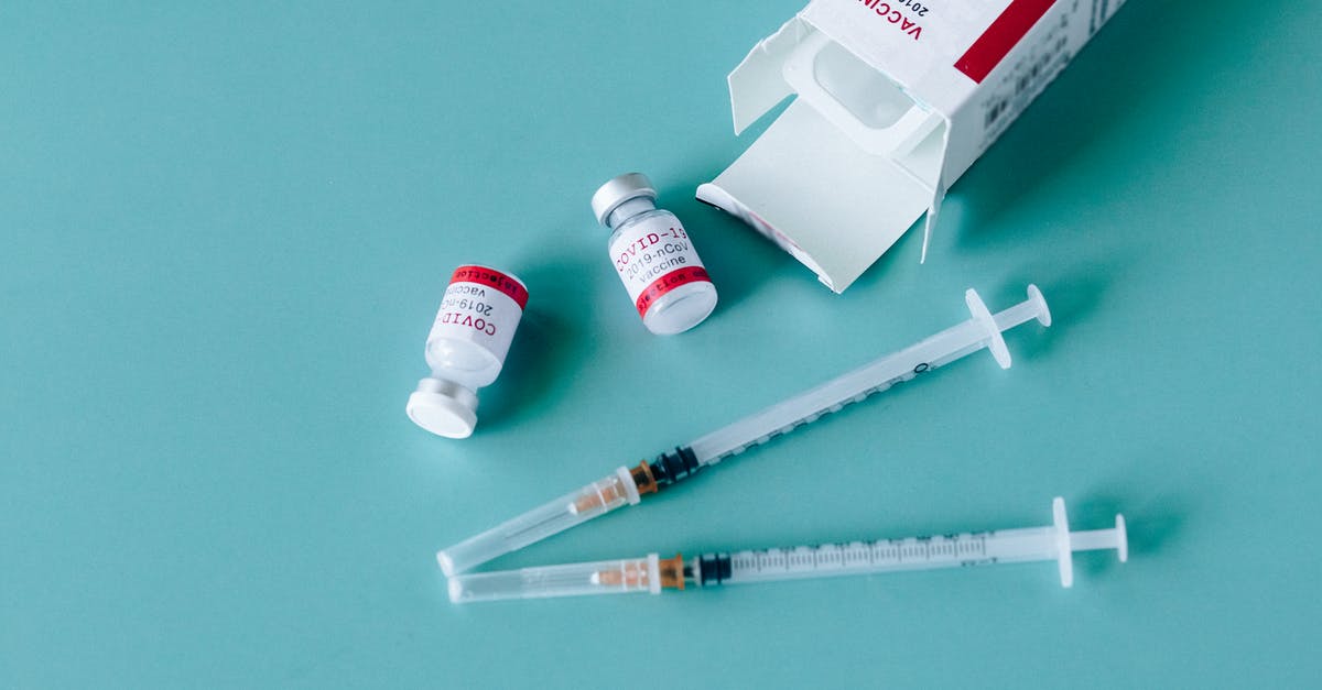 Fully cooked, but requires a minimum internal temperature? - Close-up View Of Vaccines For Covid-19