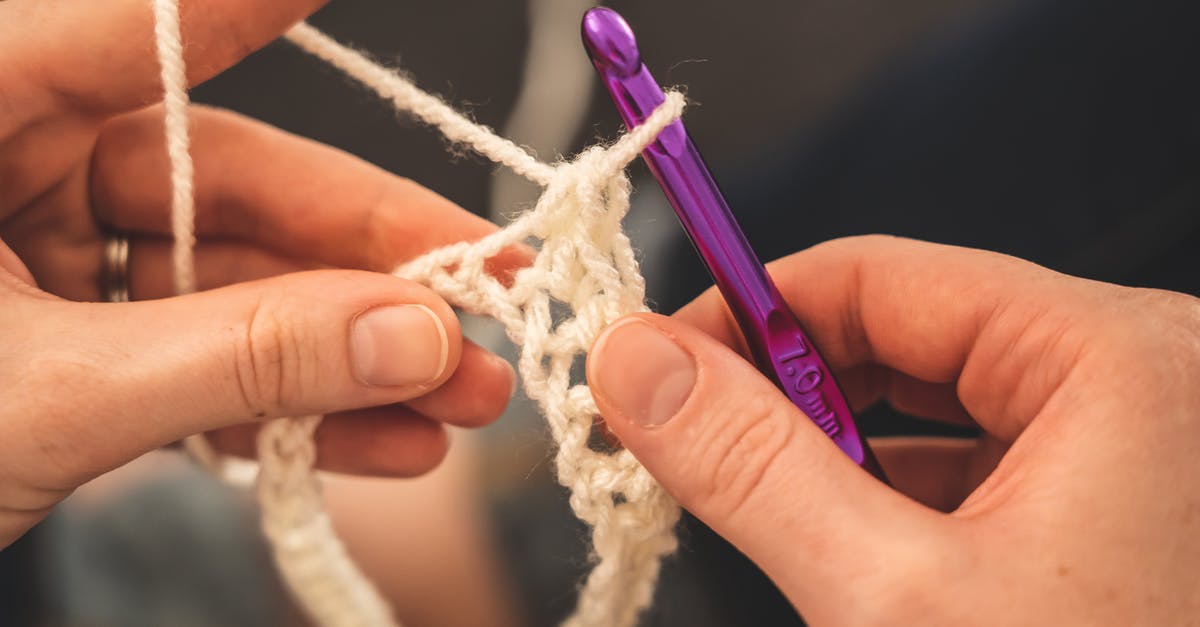 General Principles of making risotto - Person Holding Purple Crochet Hook and White Yarn