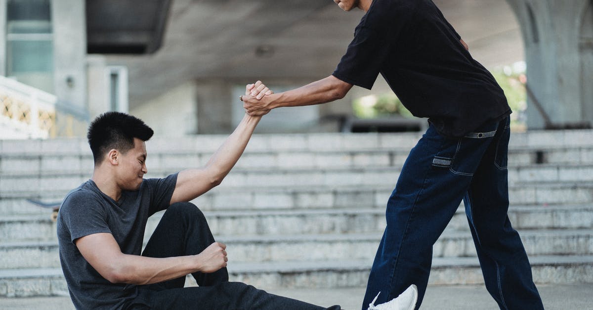 Getting Potato and Turnip Patties to hold together... how? - Asian man helping friend to get up from ground