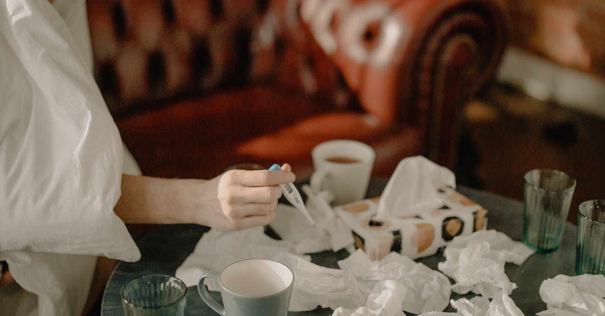 Glass still safe after boil-off? - Person Holding White Ceramic Mug