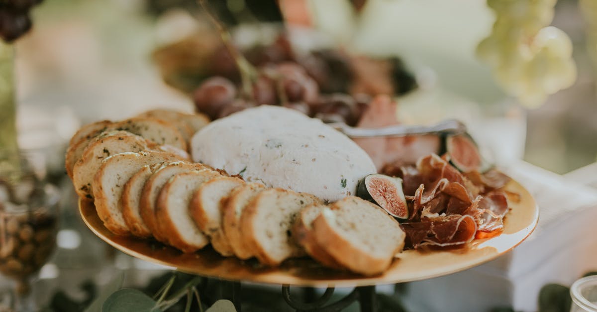 Goat cheese royale definition? - Bread With White Cream on White Ceramic Plate