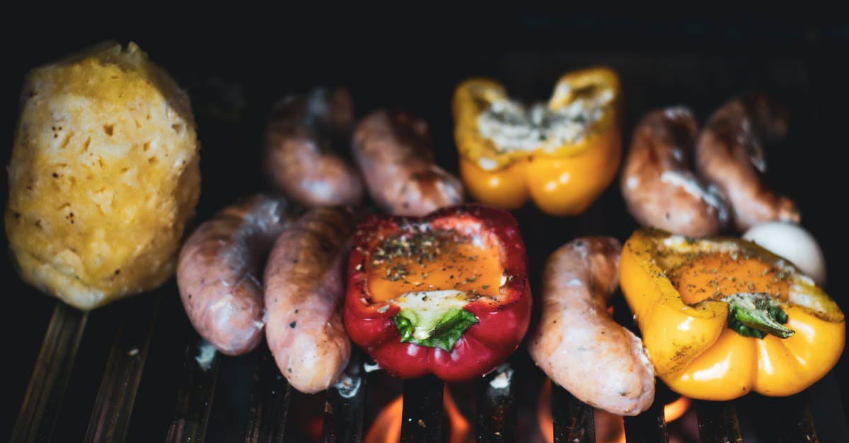 Grilling veggies & meat on same surface for vegetarian guests - Capsicums and Sausages on a Flame Griller