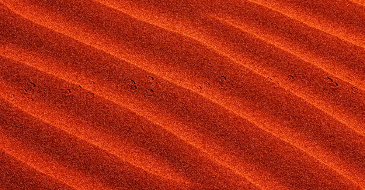 Gritty Buttermilk Gravy - Orange Textile in Close Up Photography