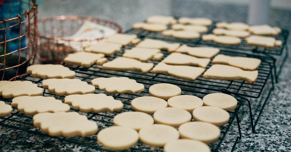 Gritty texture in cookies - Assorted-shape Pastries on Black Steel Trays