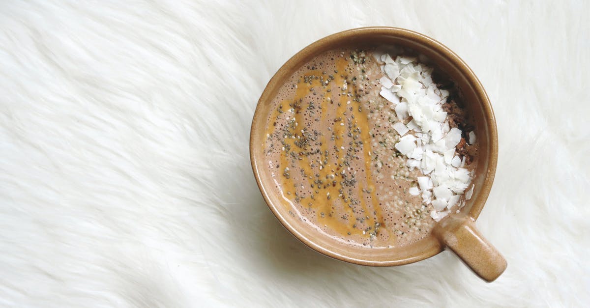 Gritty White Chocolate - Brown Liquid in Cup Gritty White Chocolate - Brown Liquid in Cup