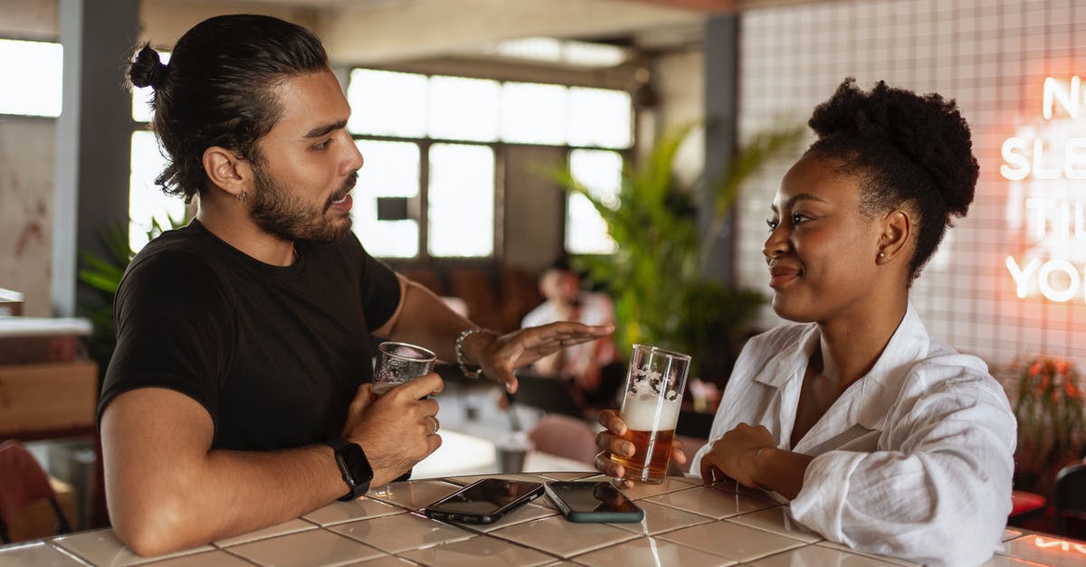 Groceries left out on the counter - Man in Black Crew Neck T-shirt Holding Silver Smartphone