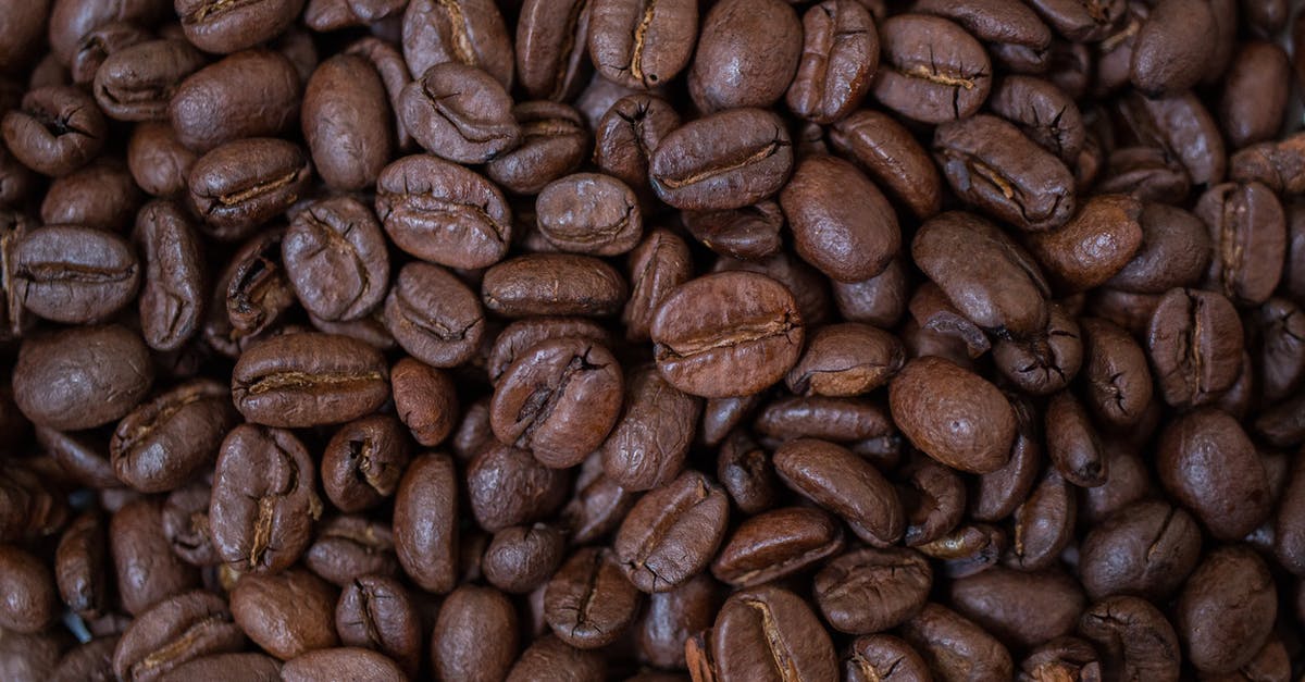 Ham and beans in a Crock-Pot [duplicate] - Coffee Beans on Brown Wooden Table