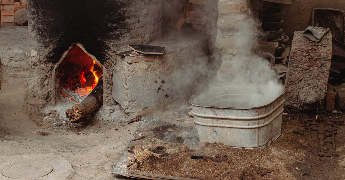 Heat diffuser for ceramic cooktop - Smoke From a Large Metal Tub 