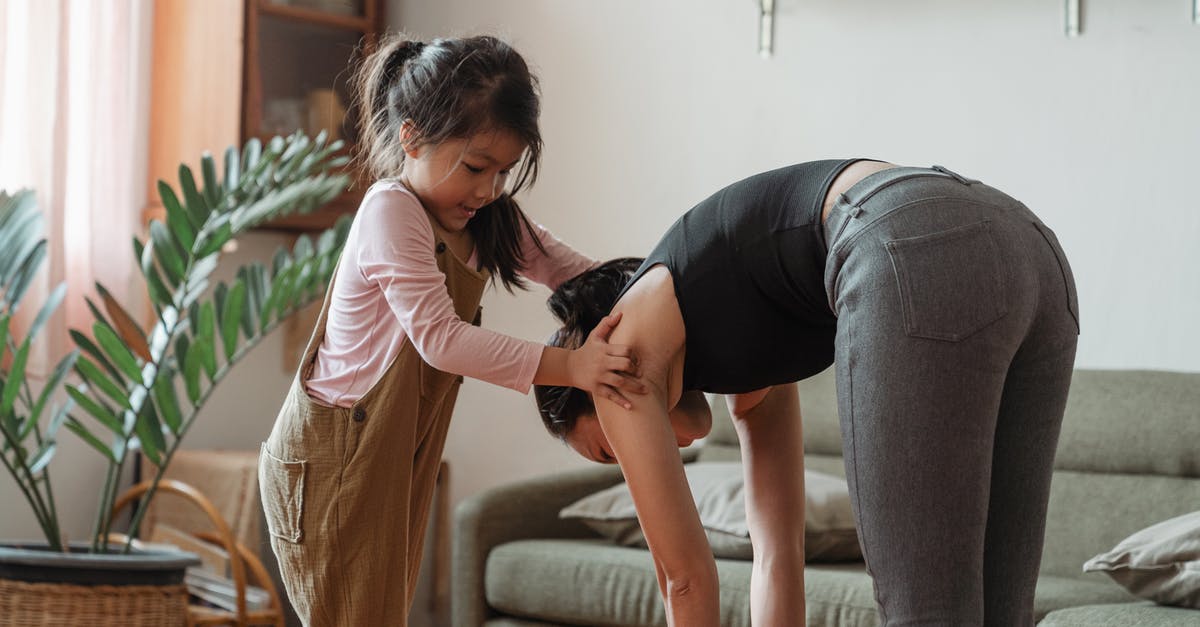 Help me duplicate Potbelly's fat-free vinaigrette - Young flexible ethnic woman with cute daughter during workout together