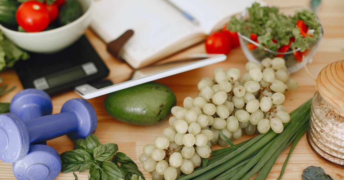 Hints on storage of vegetables and fruit - Close-up of Fruit and Vegetables on a Table