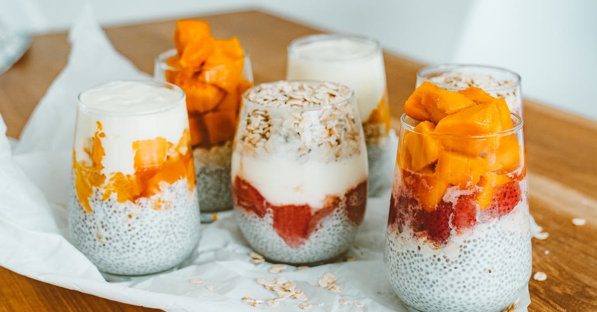 Homemade fermented coconut milk - Chia Seeds and Yoghurt Cream on Clear Glasses