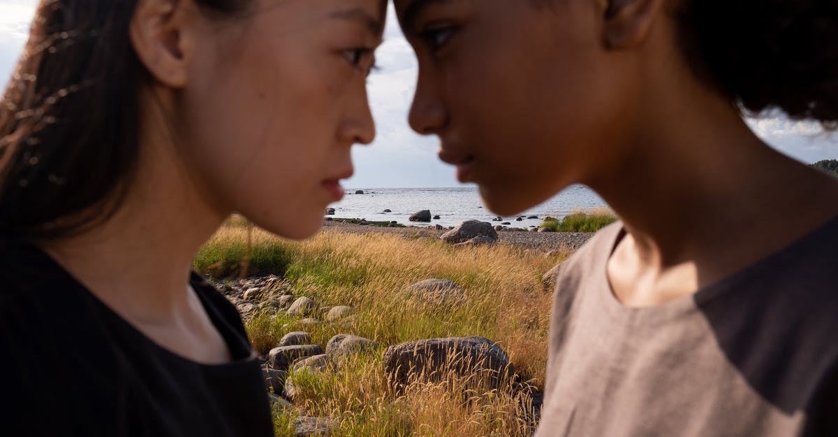 hominy grits versus masa harina - A Side View of Women Touching Heads