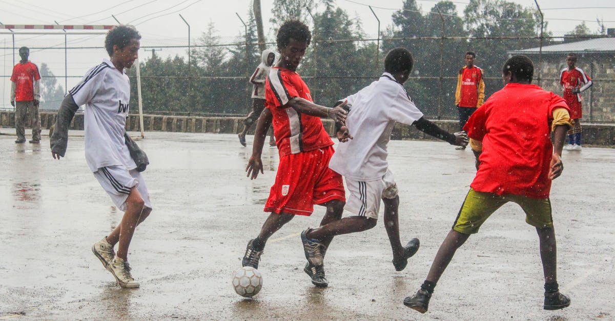 hominy grits versus masa harina - Men Playing Soccer Under the Rain